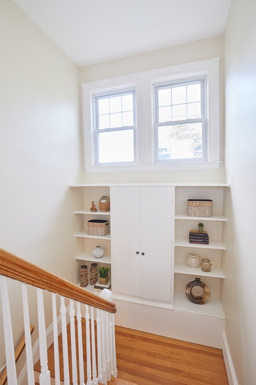 92 Coolidge Street, Unit 2 Brookline, MA 02446 - Photo 14 of 29 a view of a hardwood floor and window in a room