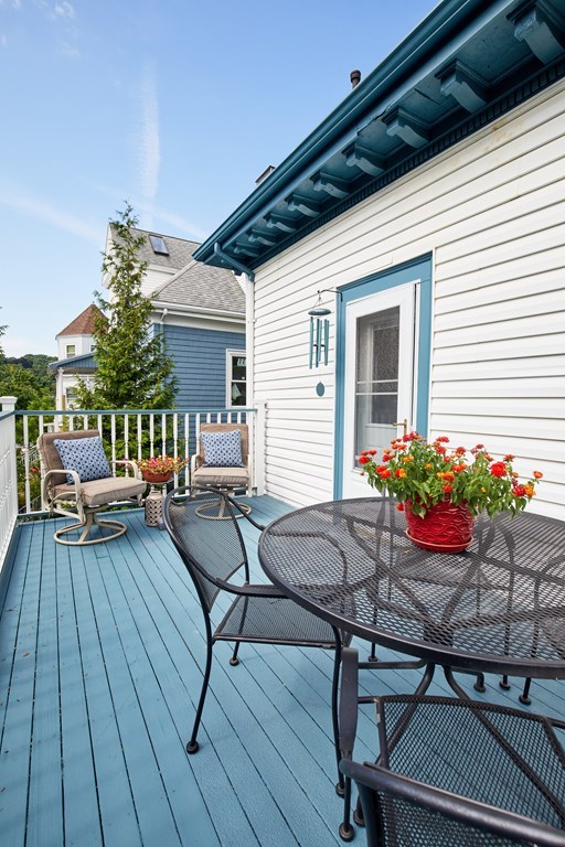 92 Coolidge Street, Unit 2 Brookline, MA 02446 - Photo 28 of 29 a view of a house with backyard and sitting area