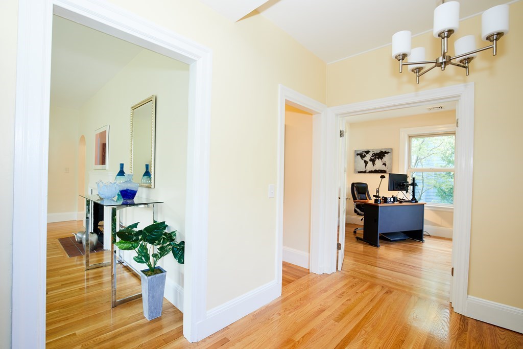 92 Coolidge Street, Unit 2 Brookline, MA 02446 - Photo 4 of 29 a living room with furniture and a wooden floor