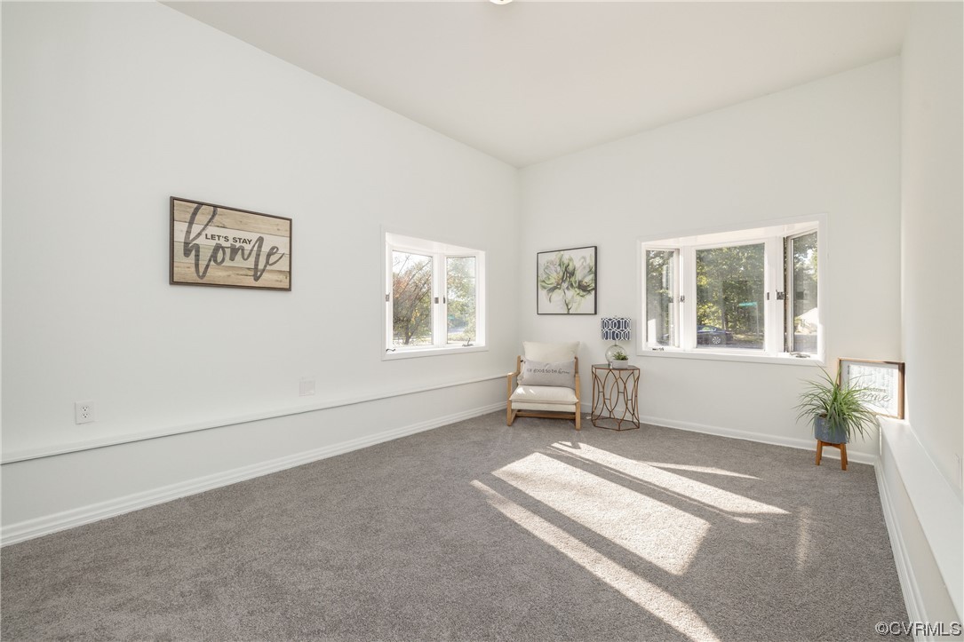 1701 Quail Covey Road Henrico, VA 23238 - Photo 20 of 45 a living room with furniture and a window