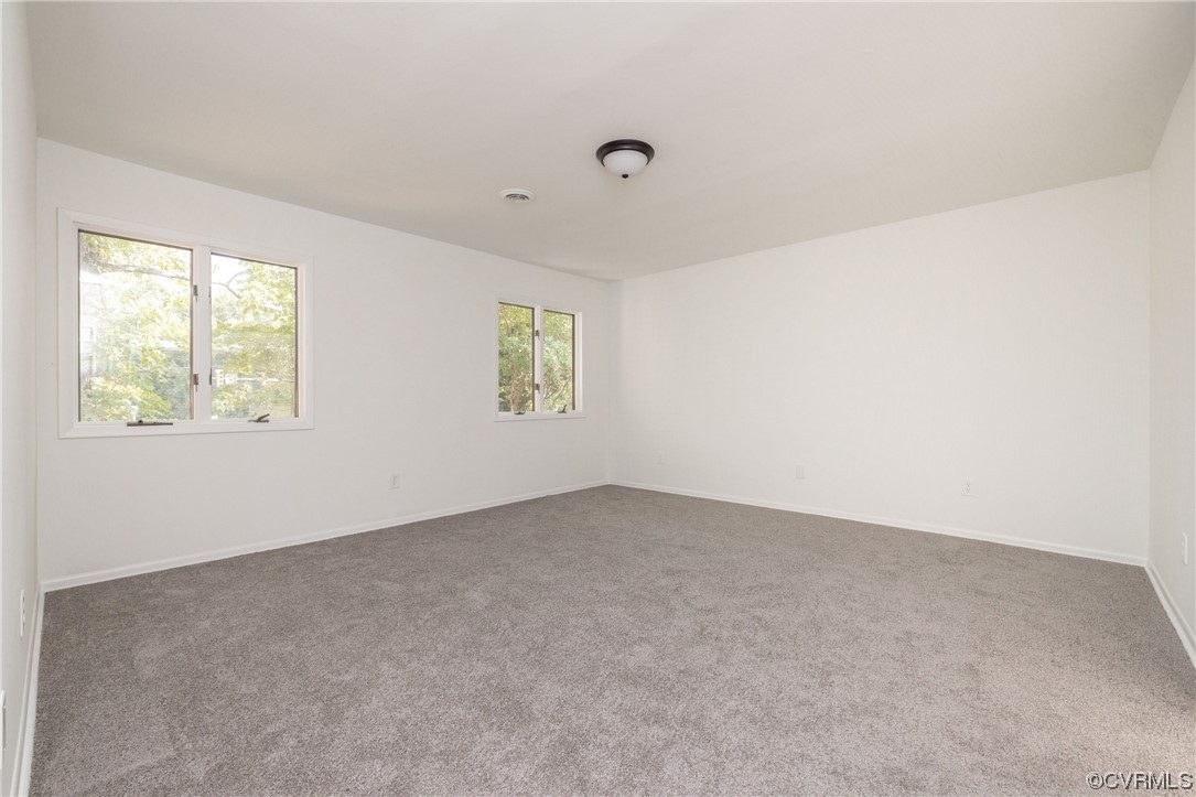 1701 Quail Covey Road Henrico, VA 23238 - Photo 23 of 45 an empty room with windows