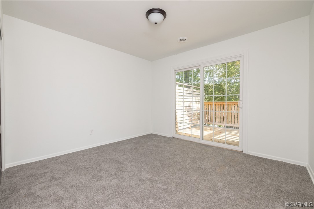 1701 Quail Covey Road Henrico, VA 23238 - Photo 27 of 45 a view of an empty room with a window
