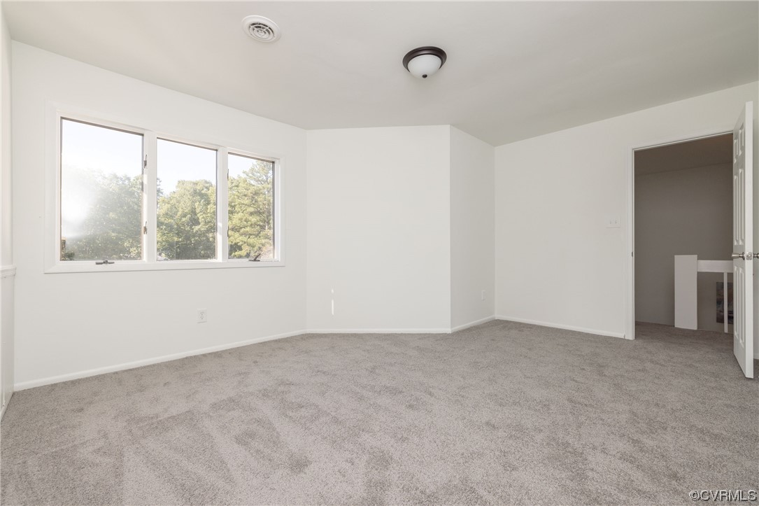 1701 Quail Covey Road Henrico, VA 23238 - Photo 30 of 45 an empty room with a window