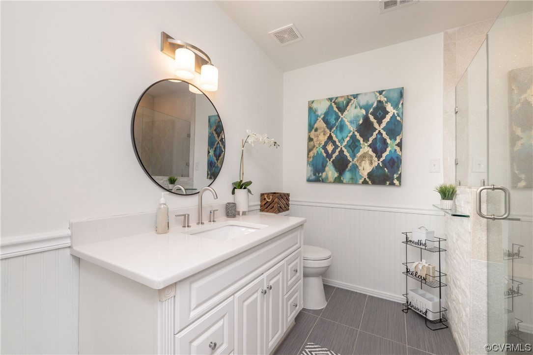 1701 Quail Covey Road Henrico, VA 23238 - Photo 33 of 45 a bathroom with a sink and a mirror