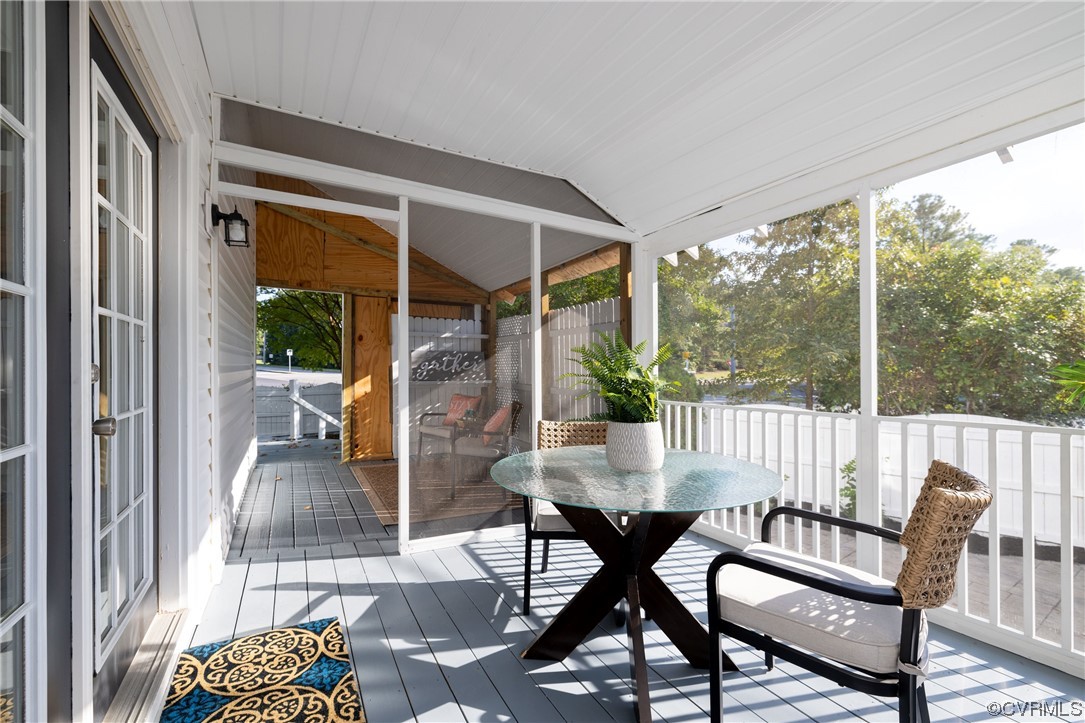 1701 Quail Covey Road Henrico, VA 23238 - Photo 37 of 45 a view of a porch with furniture and wooden floor