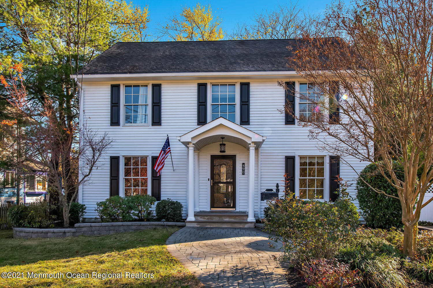 490 River Road Fair Haven, NJ 07704 - Photo 1 of 16 a front view of a house with a yard
