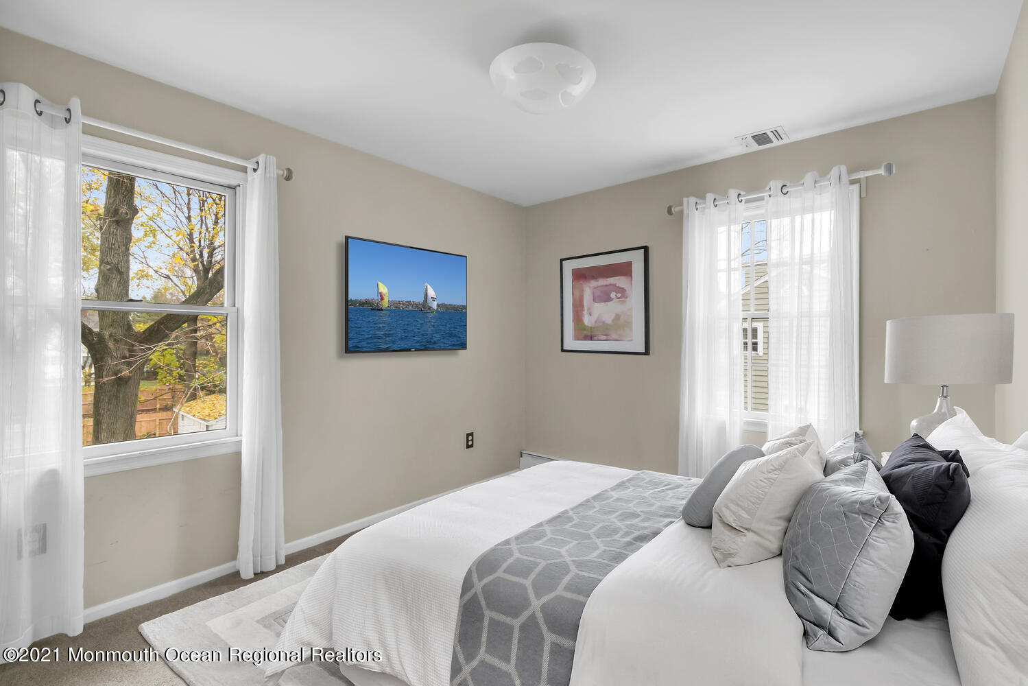 490 River Road Fair Haven, NJ 07704 - Photo 10 of 16 a bedroom with a large bed and a window