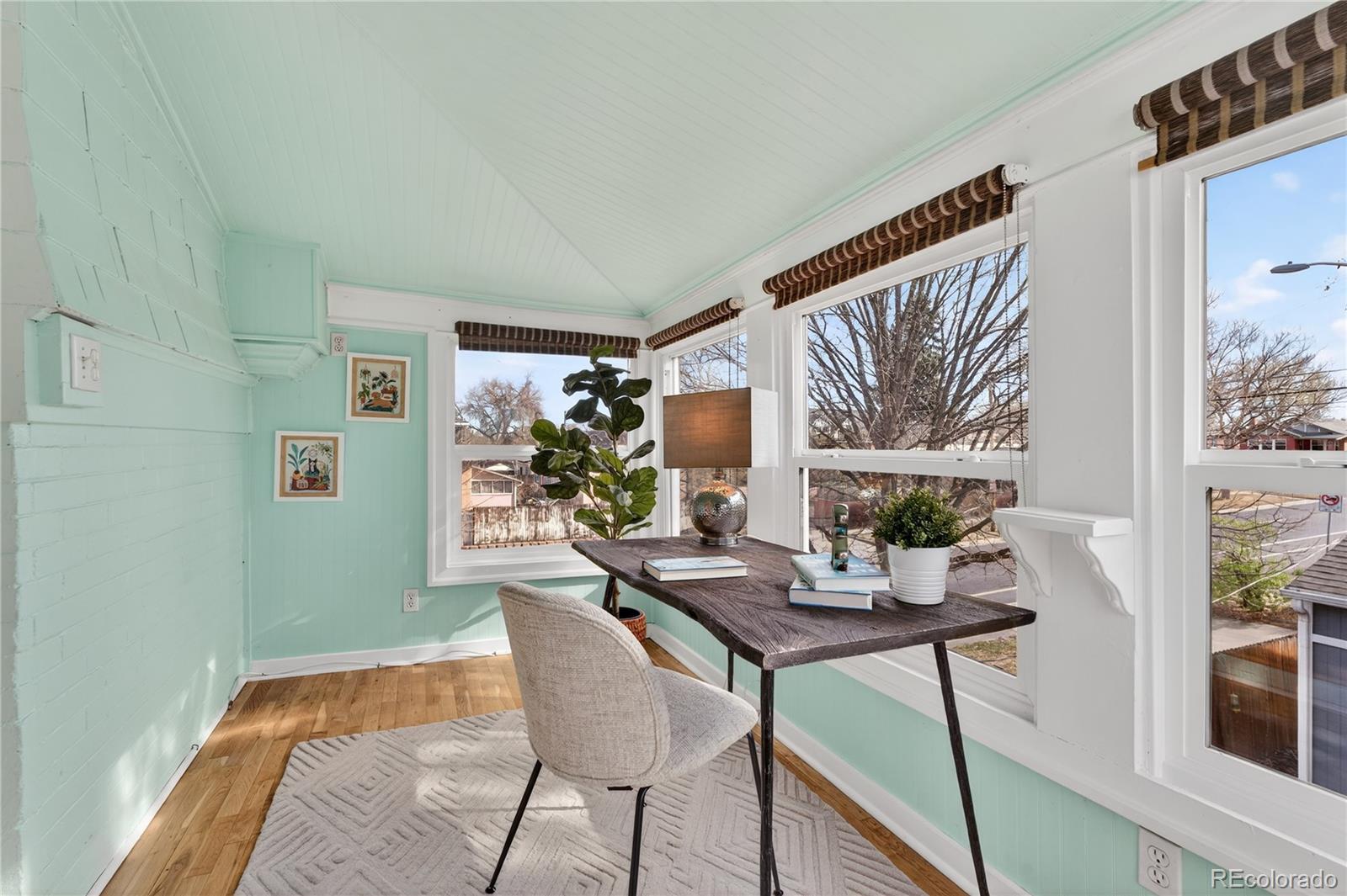 3056 York Street Denver, CO 80205 - Photo 19 of 44 a dining room with furniture and window