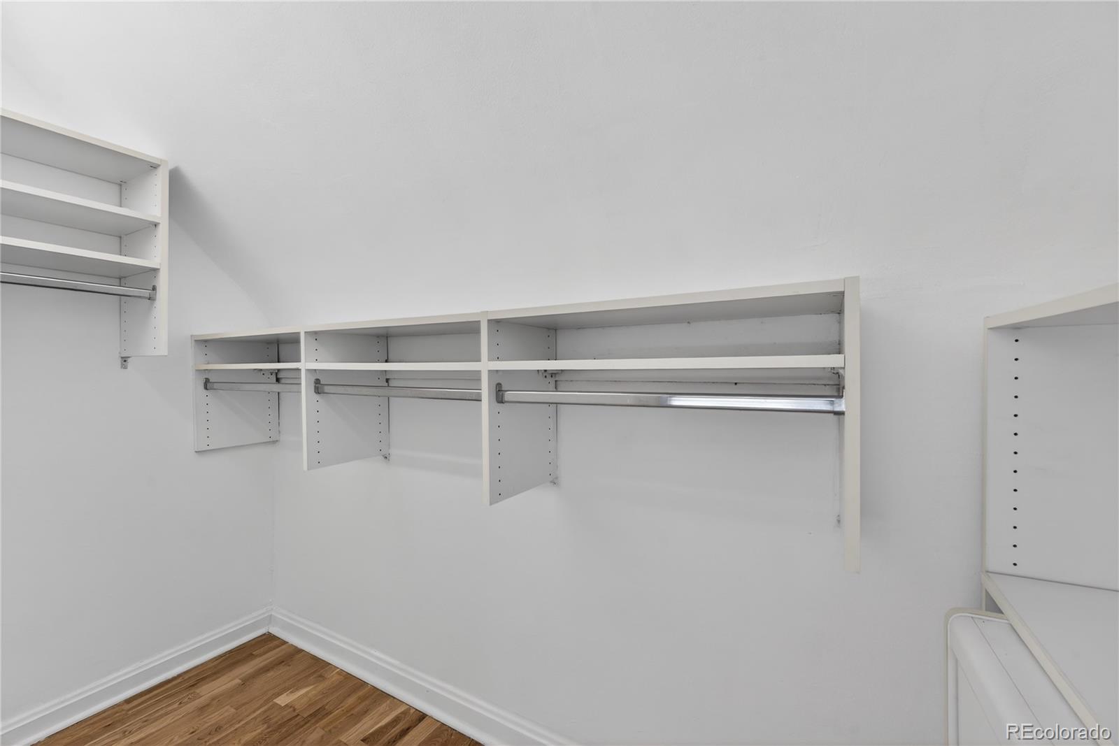 3056 York Street Denver, CO 80205 - Photo 21 of 44 a view of a room with racks on the wall