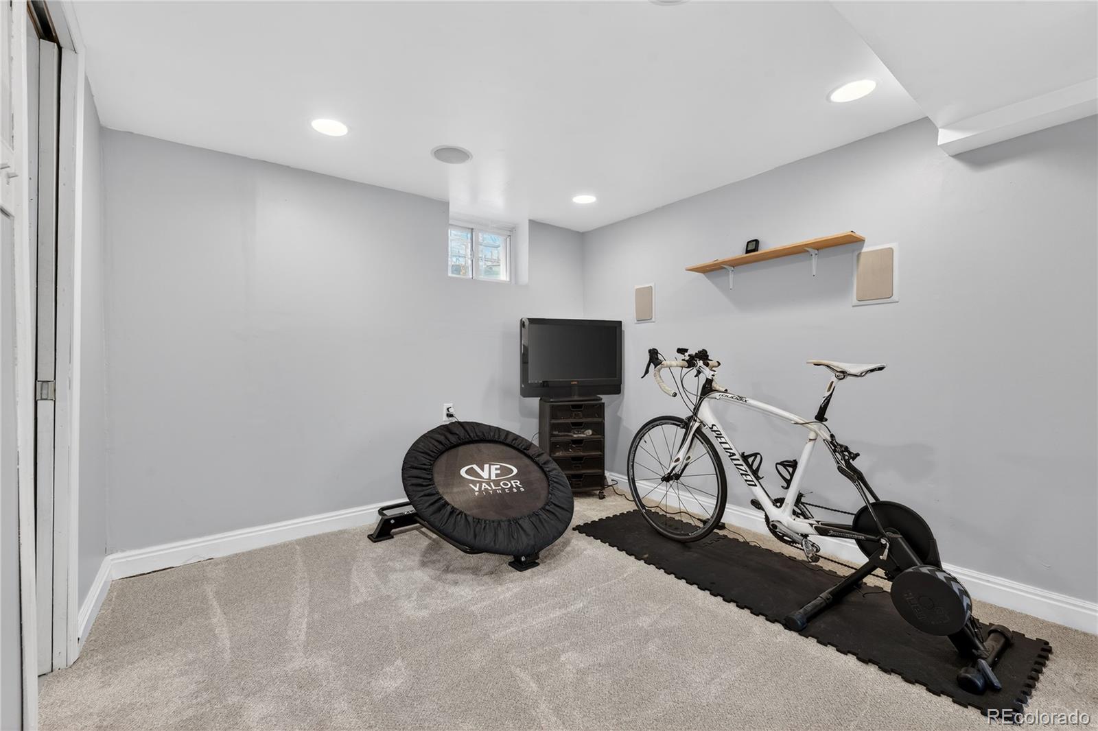 3056 York Street Denver, CO 80205 - Photo 29 of 44 a view of a room with gym equipment