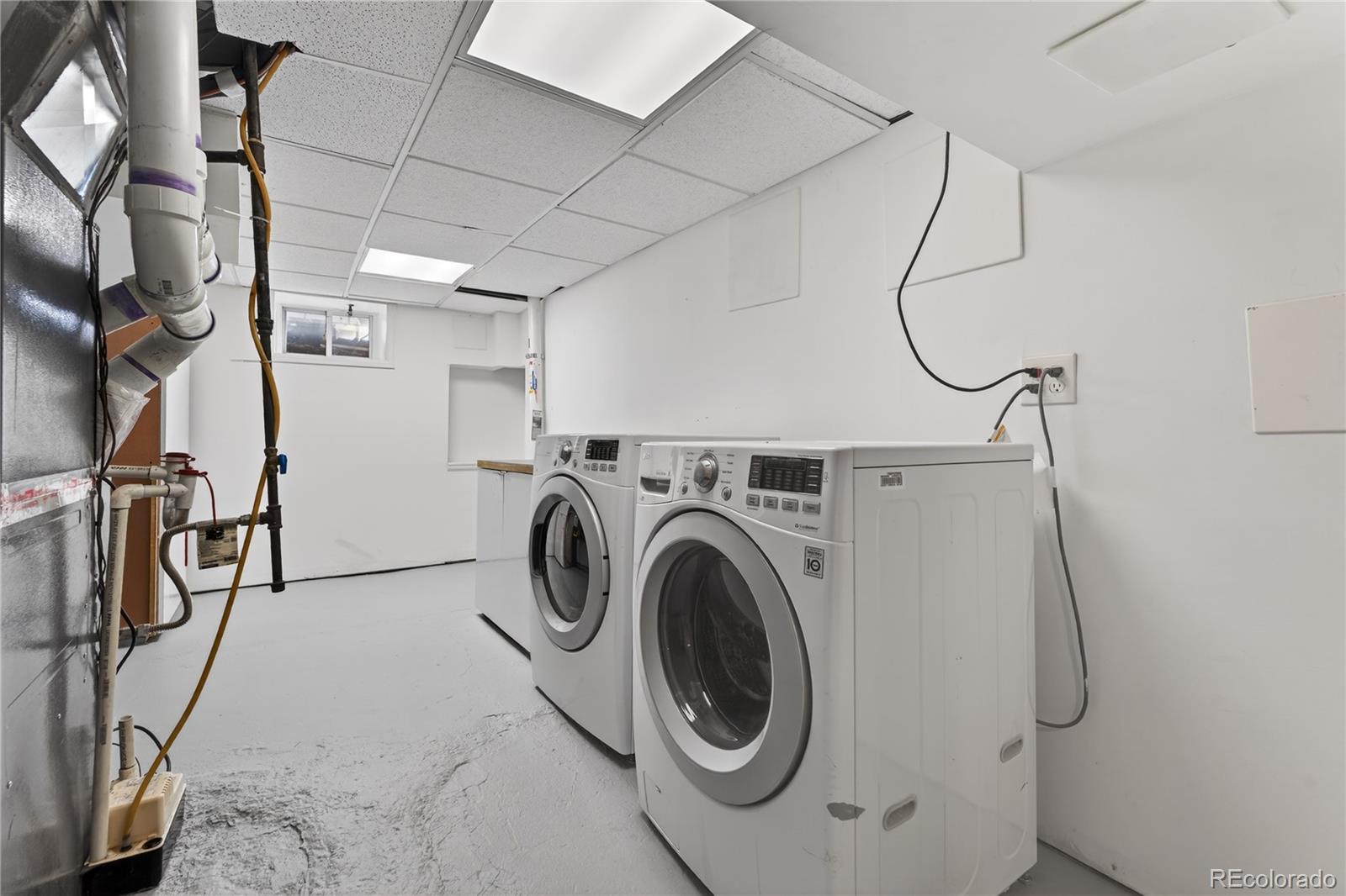 3056 York Street Denver, CO 80205 - Photo 30 of 44 a utility room with dryer and washer