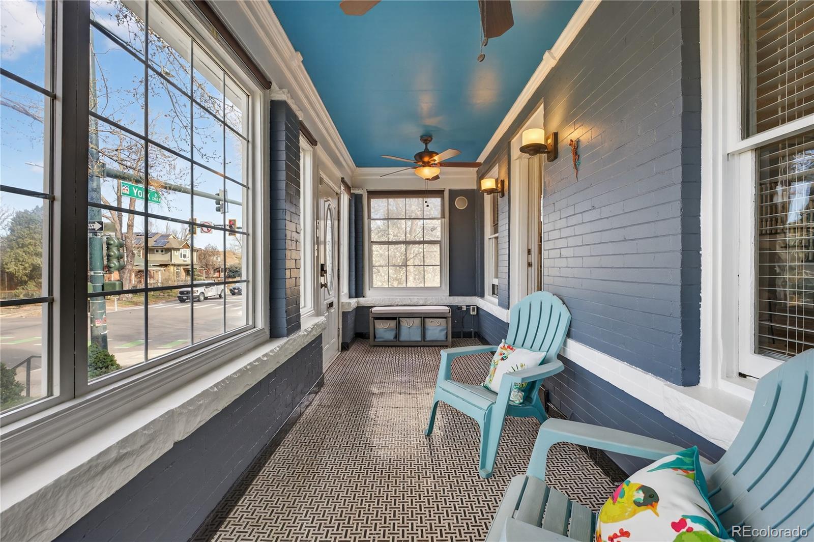 3056 York Street Denver, CO 80205 - Photo 3 of 44 a living room with furniture and a large window