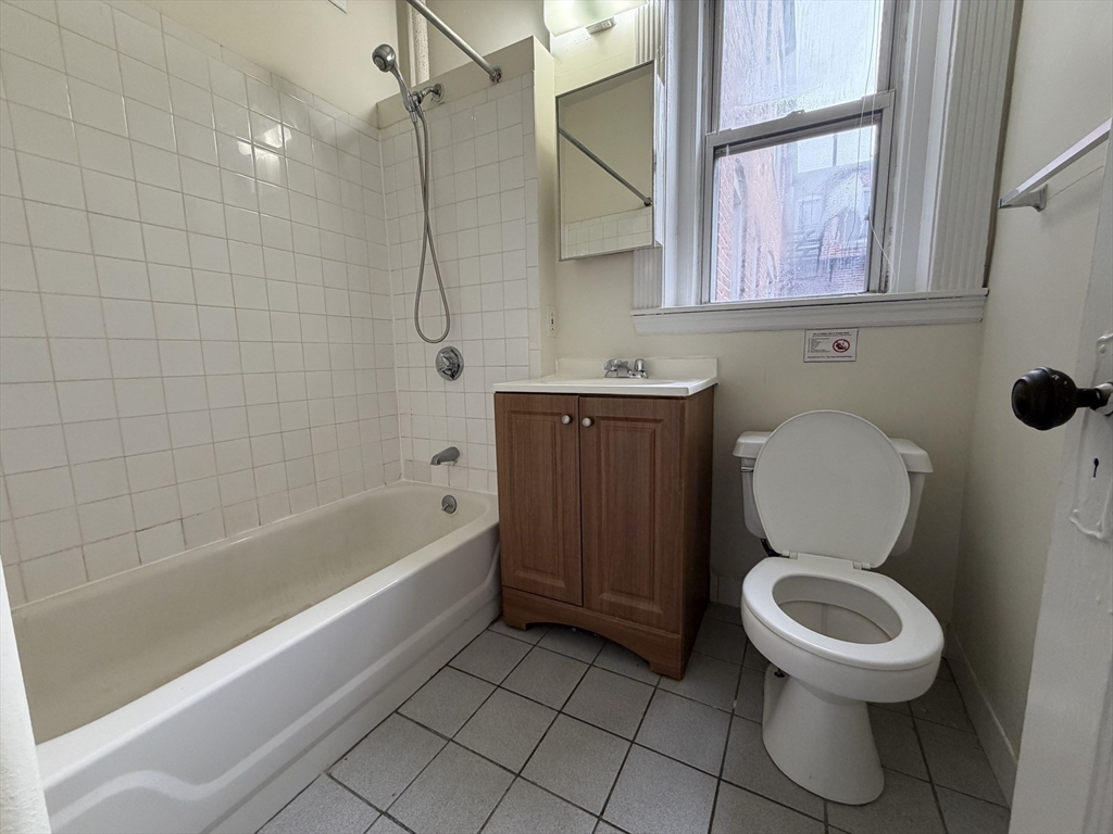 331 Huntington Avenue, Unit 45 Boston, MA 02115 - Photo 5 of 5 a bathroom with a toilet and a shower