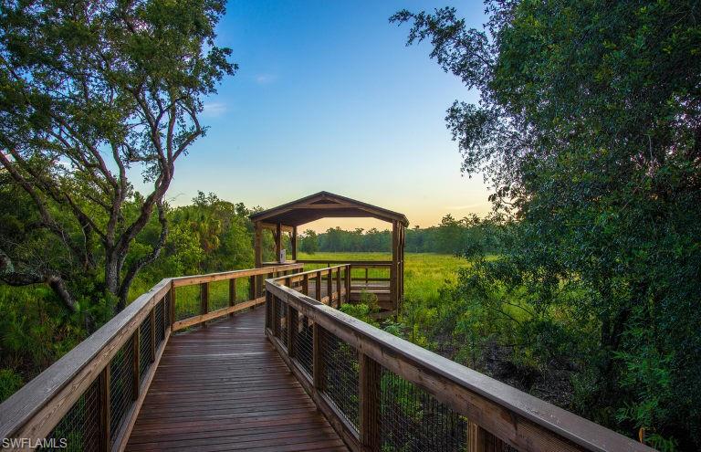 7682 Jacaranda Lane Naples, FL 34114 - Photo 26 of 30 a view of balcony and yard