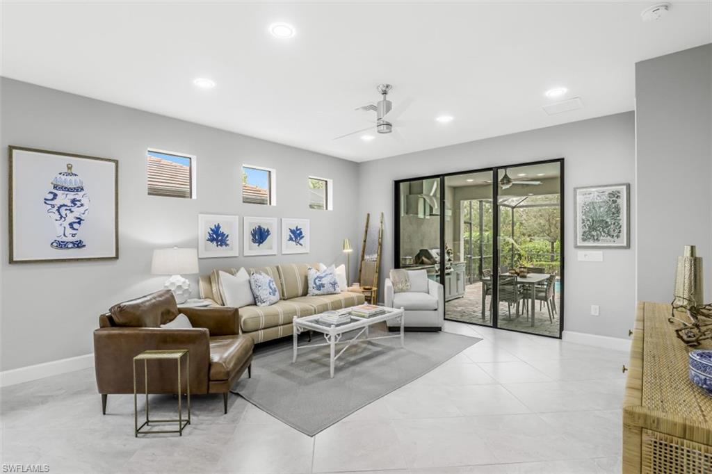 7682 Jacaranda Lane Naples, FL 34114 - Photo 7 of 30 a living room with furniture