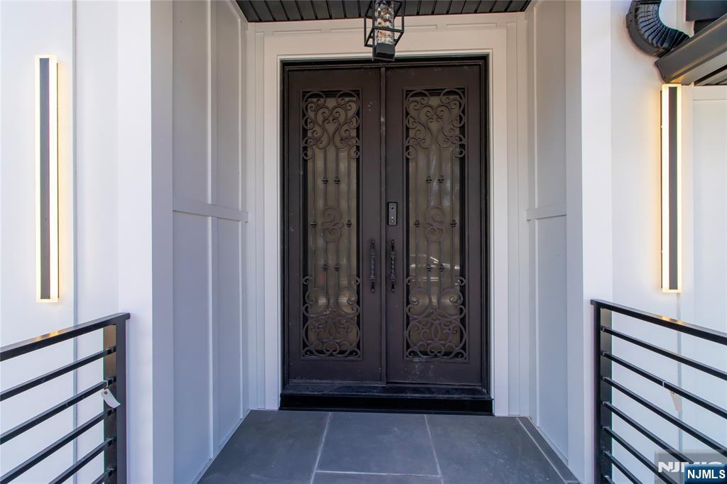 42 Harvey Street Closter, NJ 07624 - Photo 4 of 33 a view of a entryway door of the house