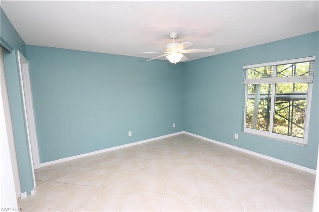 2207 San Marco Road, Unit 4104 Marco Island, FL 34145 - Photo 9 of 10 an empty room with windows