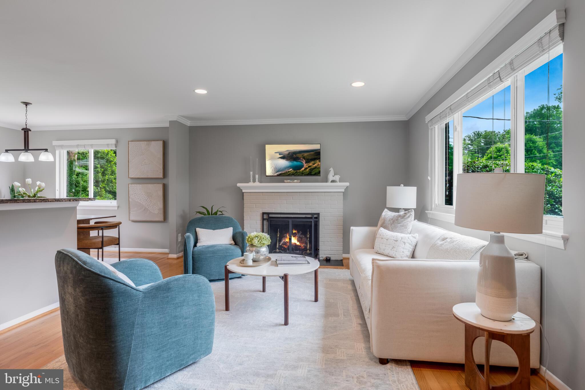 7504 Nancemond Street Springfield, VA 22150 - Photo 11 of 51 Cozy living room with fireplace