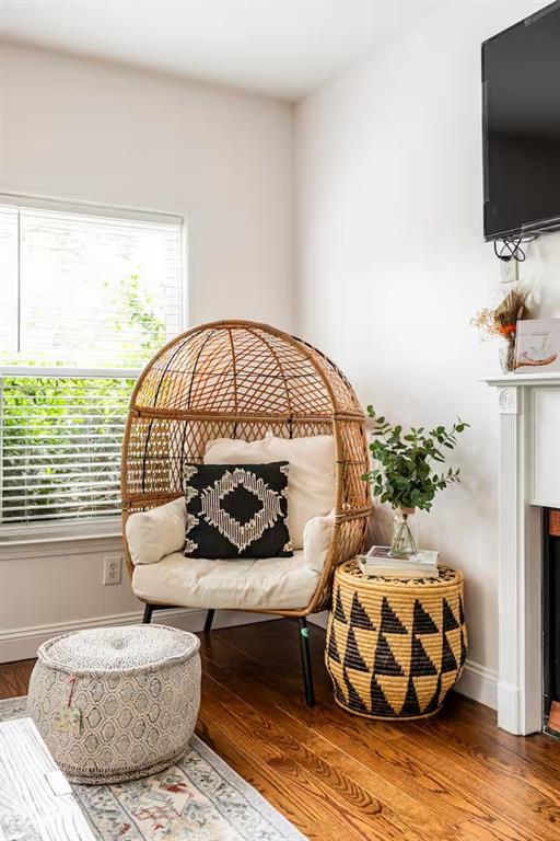 673 Windsor Street Southwest Atlanta, GA 30310 - Photo 12 of 29 a living room with furniture fireplace and flat screen tv