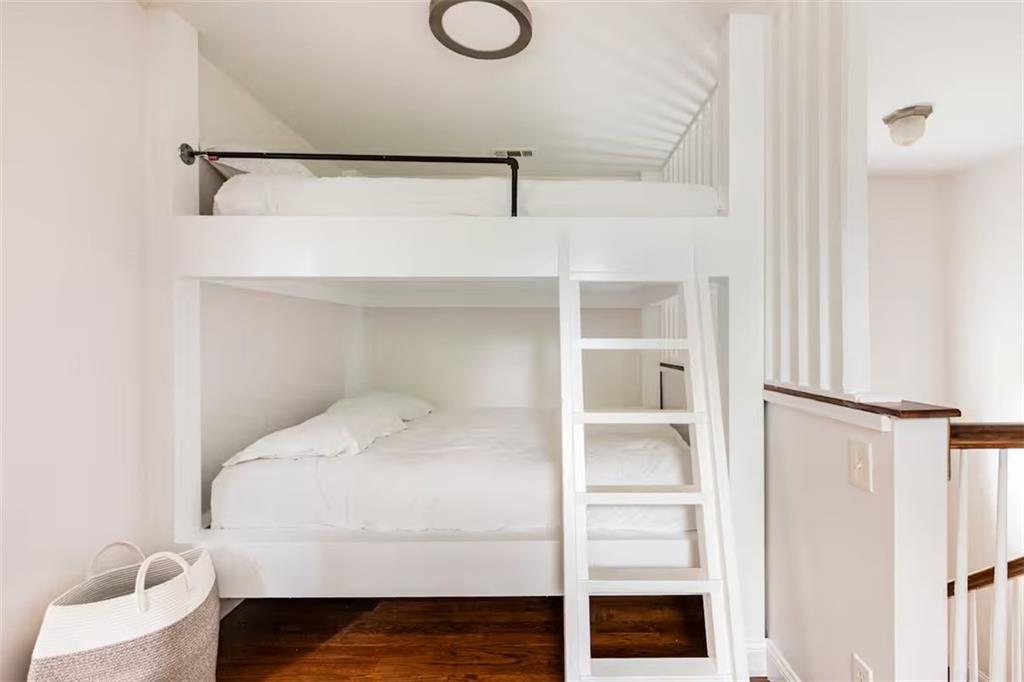 673 Windsor Street Southwest Atlanta, GA 30310 - Photo 28 of 29 a bedroom with a bed and a window