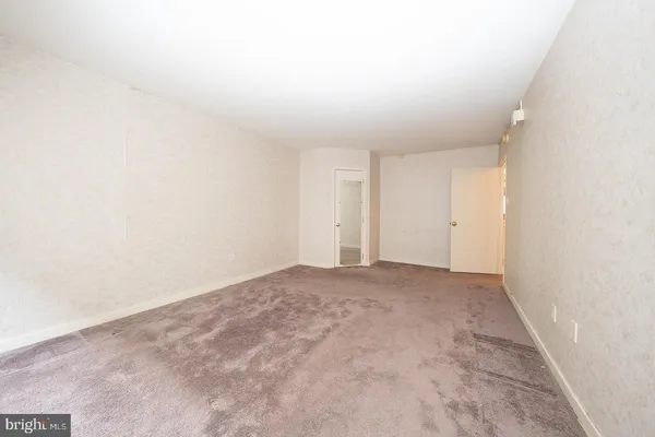 an empty room with an entryway
