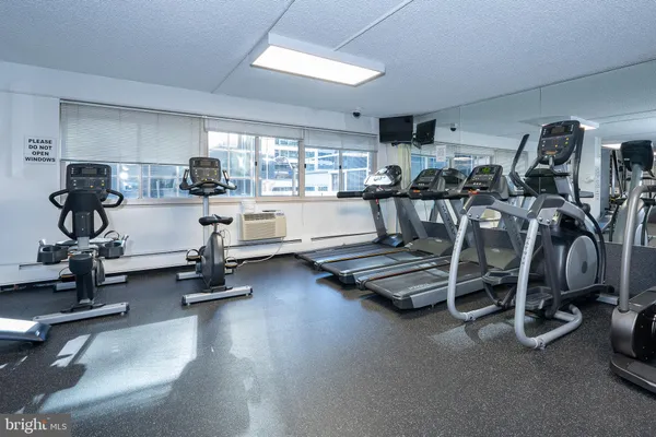 a view of a room with gym equipment