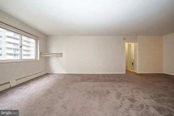 an empty room with windows