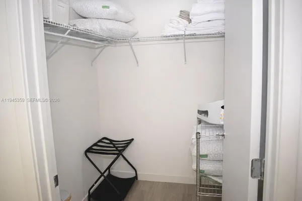 a view of a room with rack on the wall