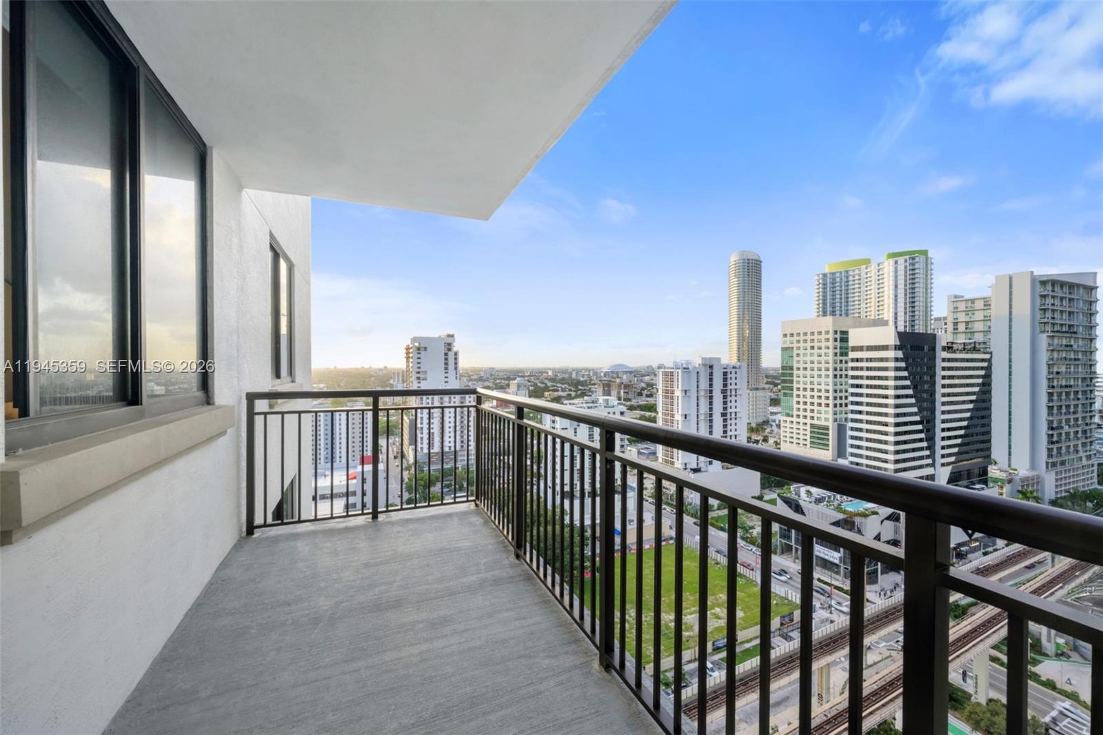 999 Southwest 1st Avenue, Unit 2214 Miami, FL 33130 - Photo 23 of 36 a view of city from a balcony