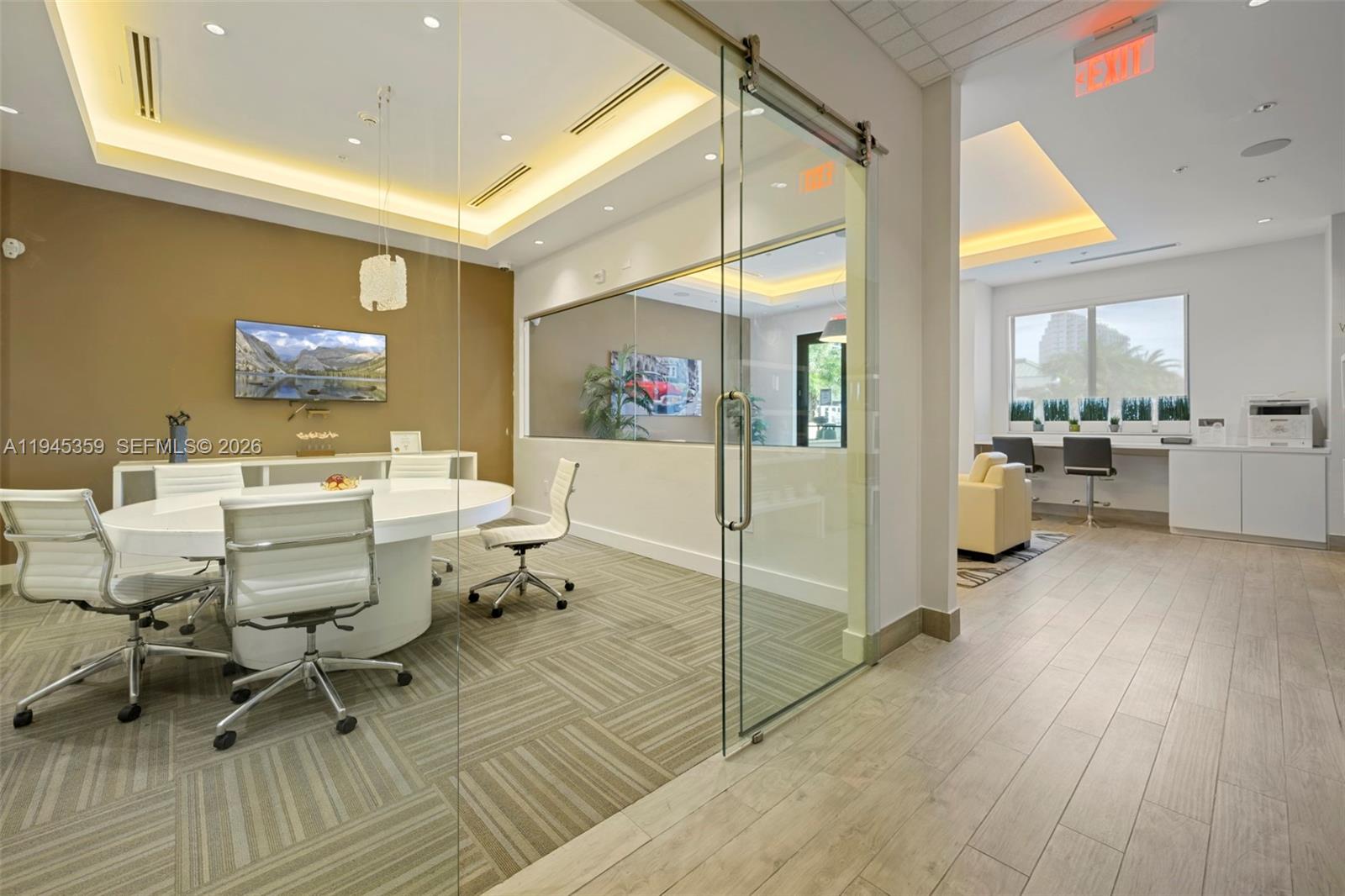 999 Southwest 1st Avenue, Unit 2214 Miami, FL 33130 - Photo 26 of 35 a room with view of wooden floor and furniture