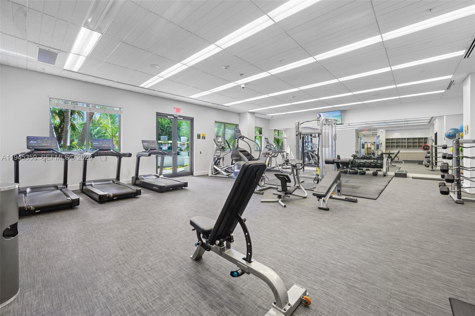 999 Southwest 1st Avenue, Unit 2214 Miami, FL 33130 - Photo 31 of 36 a view of a room with gym equipment