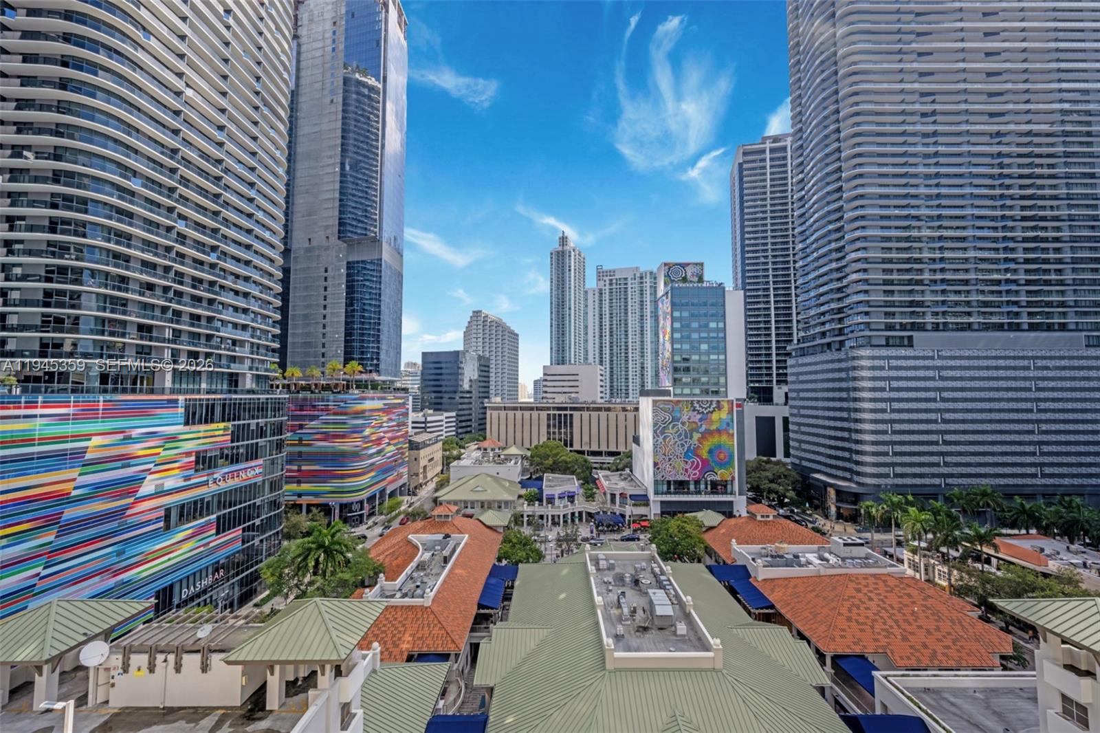 999 Southwest 1st Avenue, Unit 2214 Miami, FL 33130 - Photo 33 of 35 a city view with tall buildings and outdoor seating