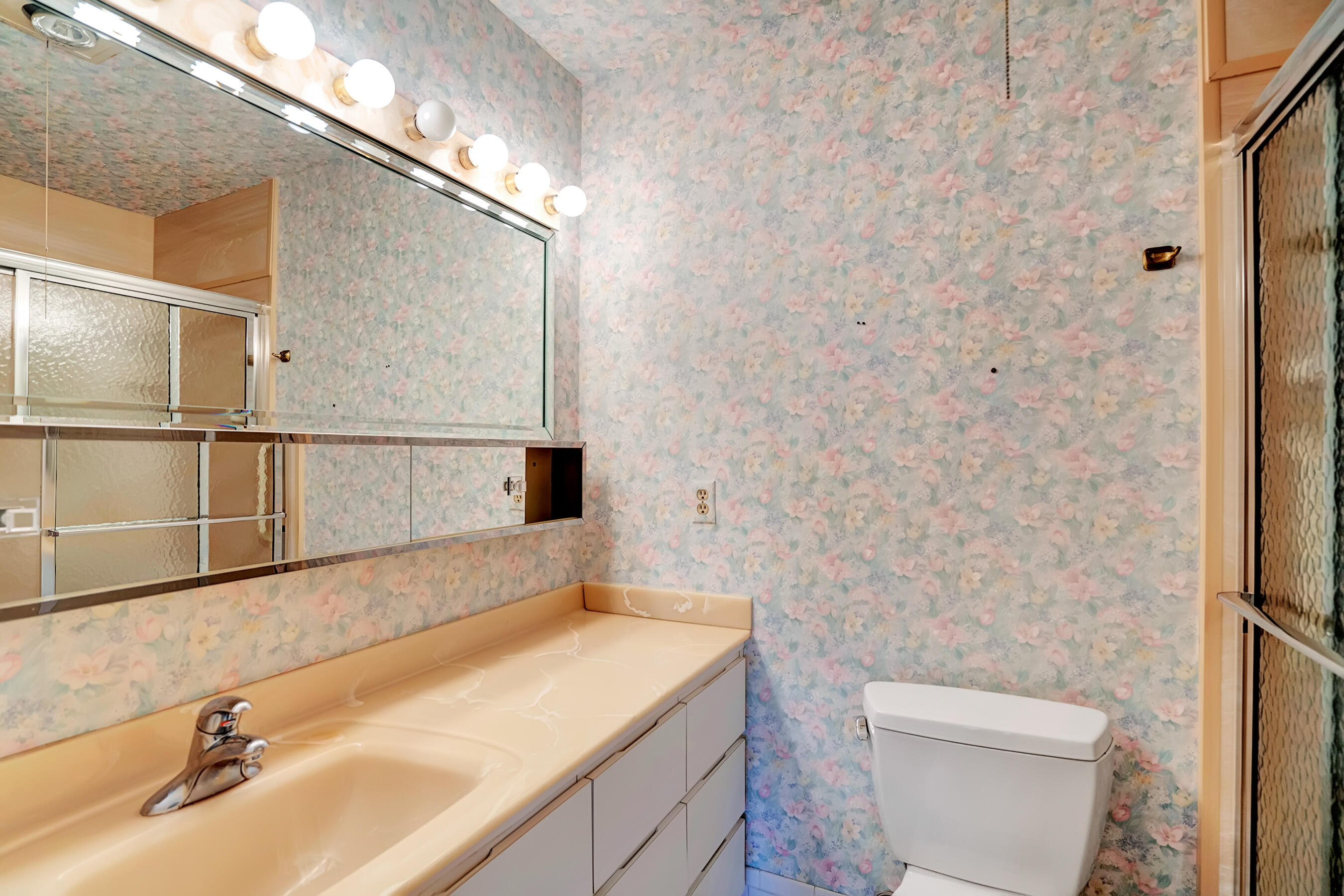 14100 Nesting Way, Unit D Delray Beach, FL 33484 - Photo 16 of 31 a bathroom with a sink and a toilet