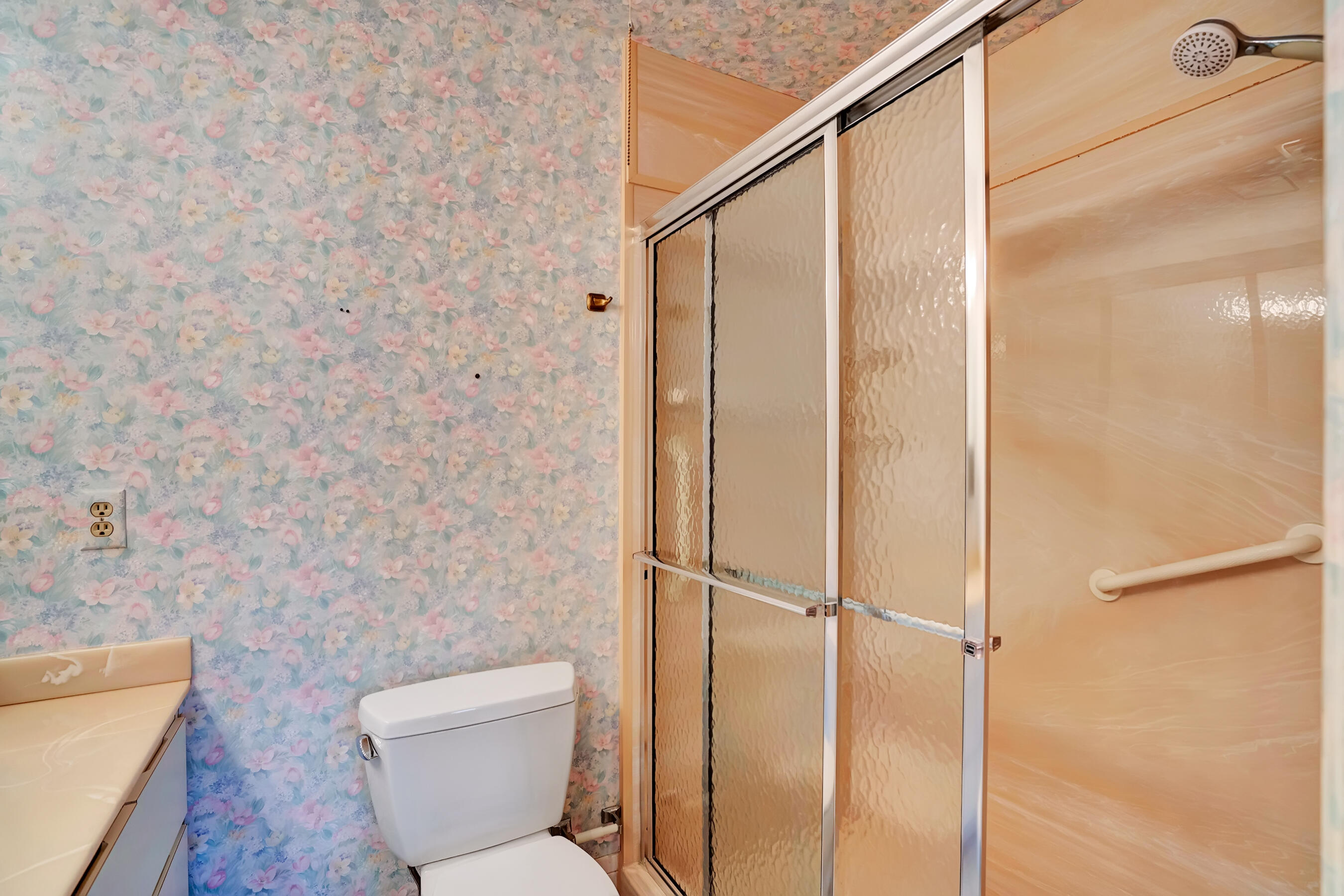 14100 Nesting Way, Unit D Delray Beach, FL 33484 - Photo 17 of 31 a bathroom with a toilet and a shower