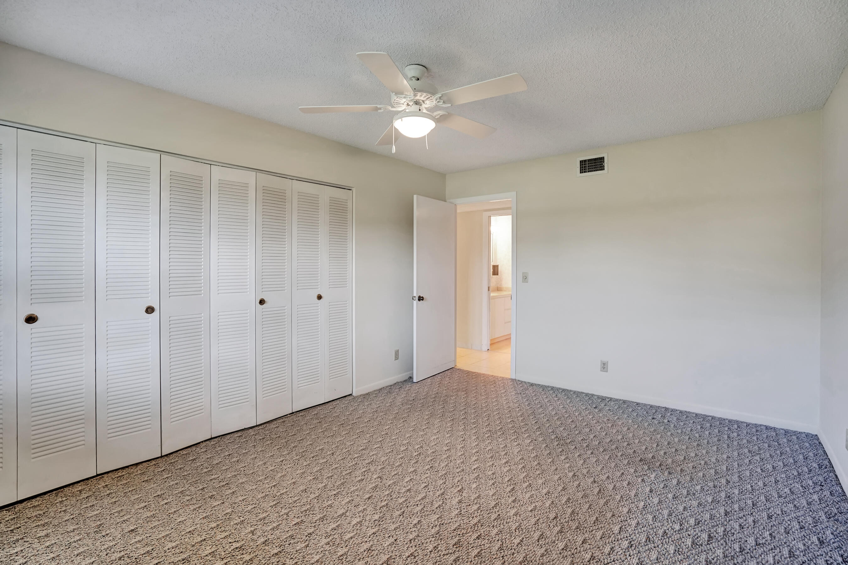 14100 Nesting Way, Unit D Delray Beach, FL 33484 - Photo 19 of 31 a view of an empty room