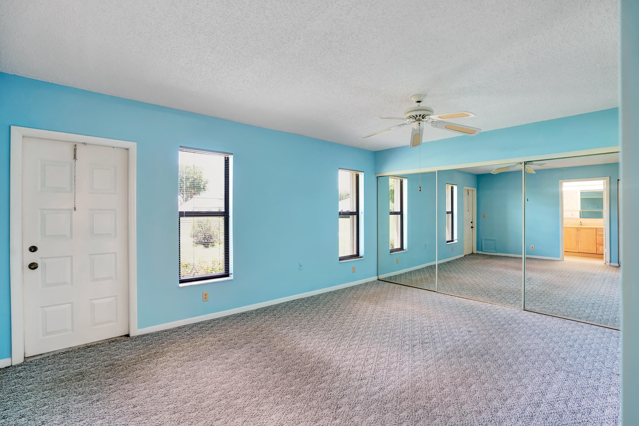 14100 Nesting Way, Unit D Delray Beach, FL 33484 - Photo 20 of 31 a view of an empty room with a window