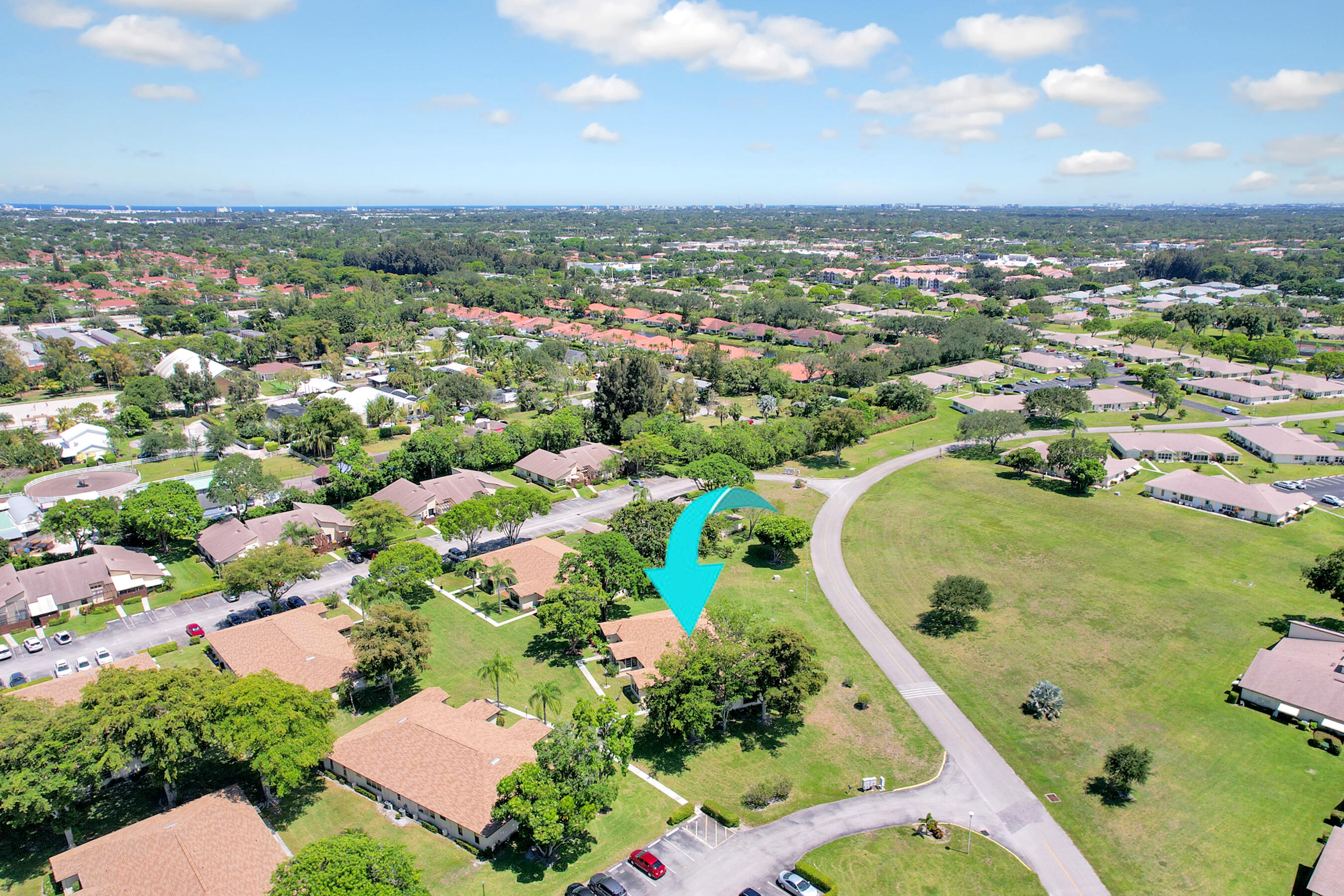14100 Nesting Way, Unit D Delray Beach, FL 33484 - Photo 24 of 31 an aerial view of residential houses with outdoor space