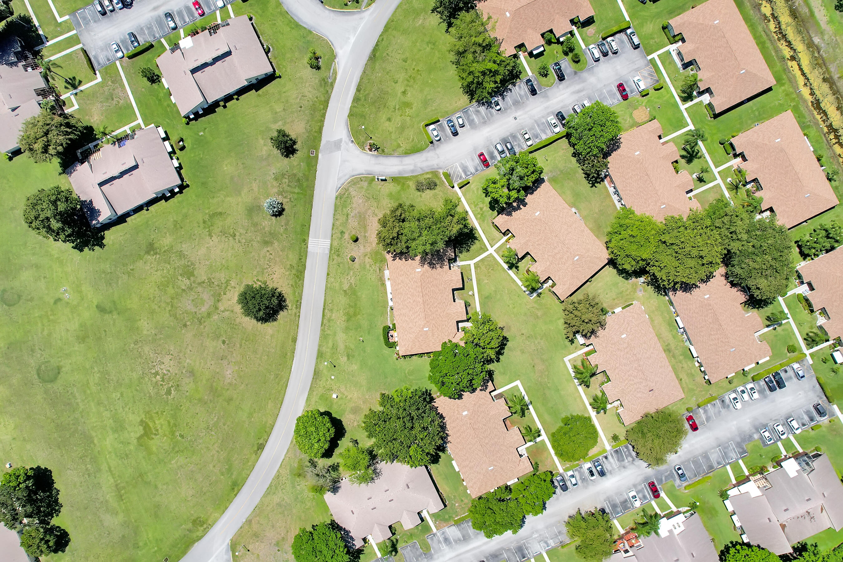 14100 Nesting Way, Unit D Delray Beach, FL 33484 - Photo 25 of 31 an aerial view of a swimming pool