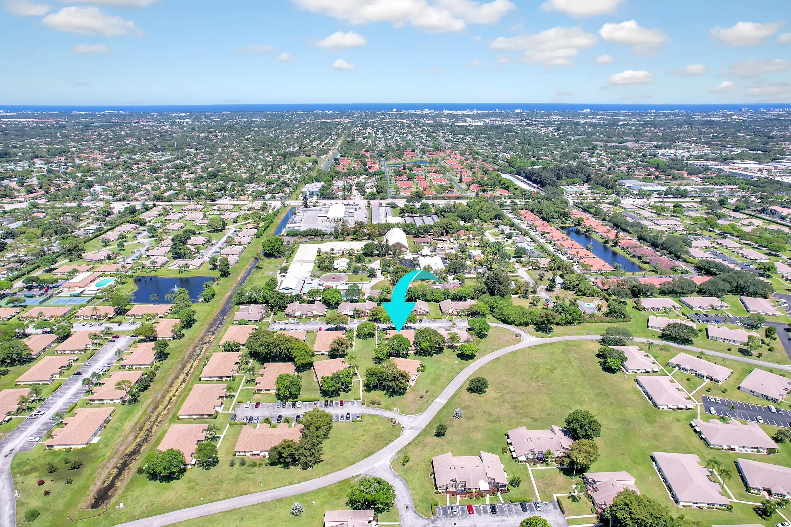 14100 Nesting Way, Unit D Delray Beach, FL 33484 - Photo 27 of 31 an aerial view of residential houses with outdoor space