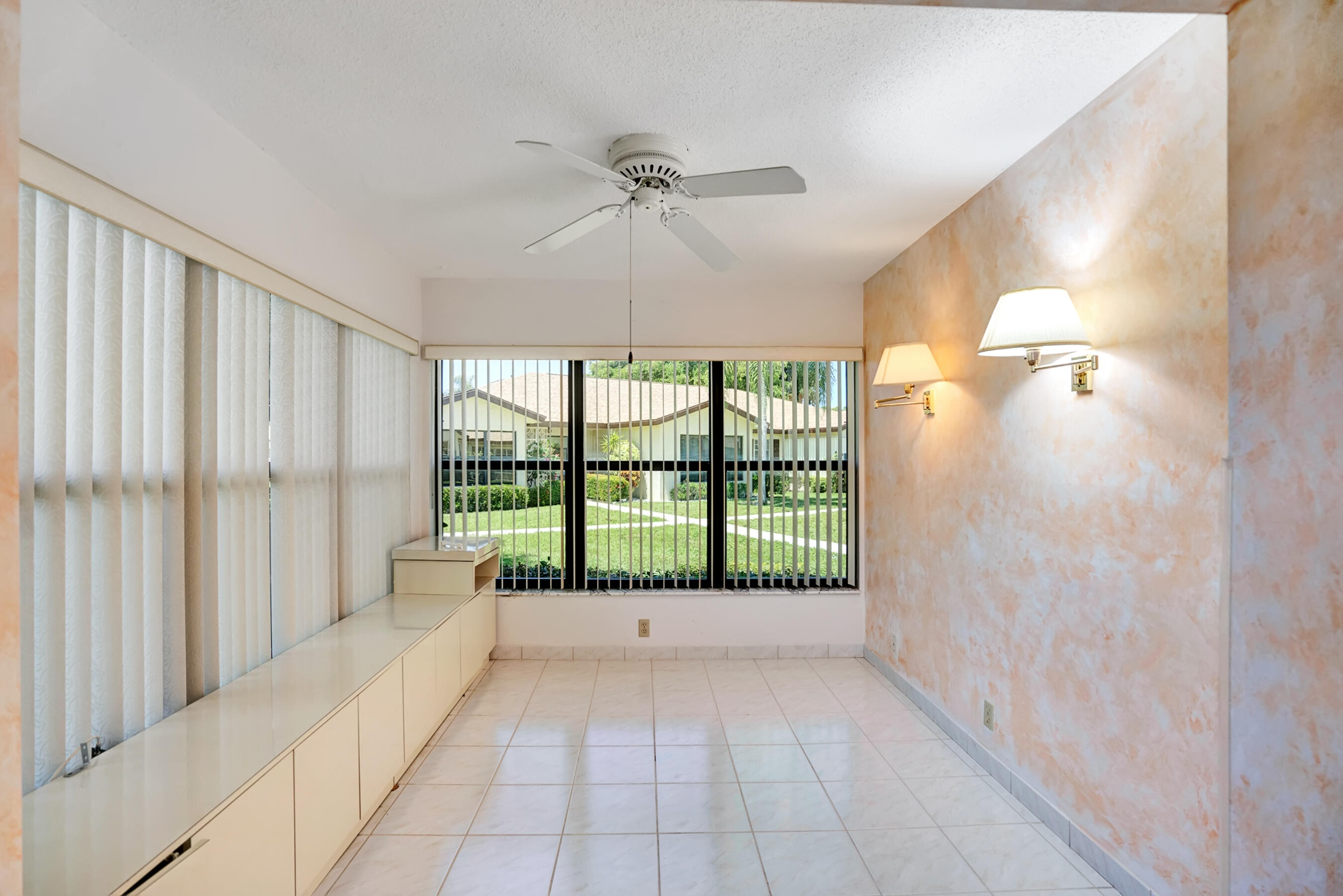 14100 Nesting Way, Unit D Delray Beach, FL 33484 - Photo 6 of 31 a view of an empty room with a window