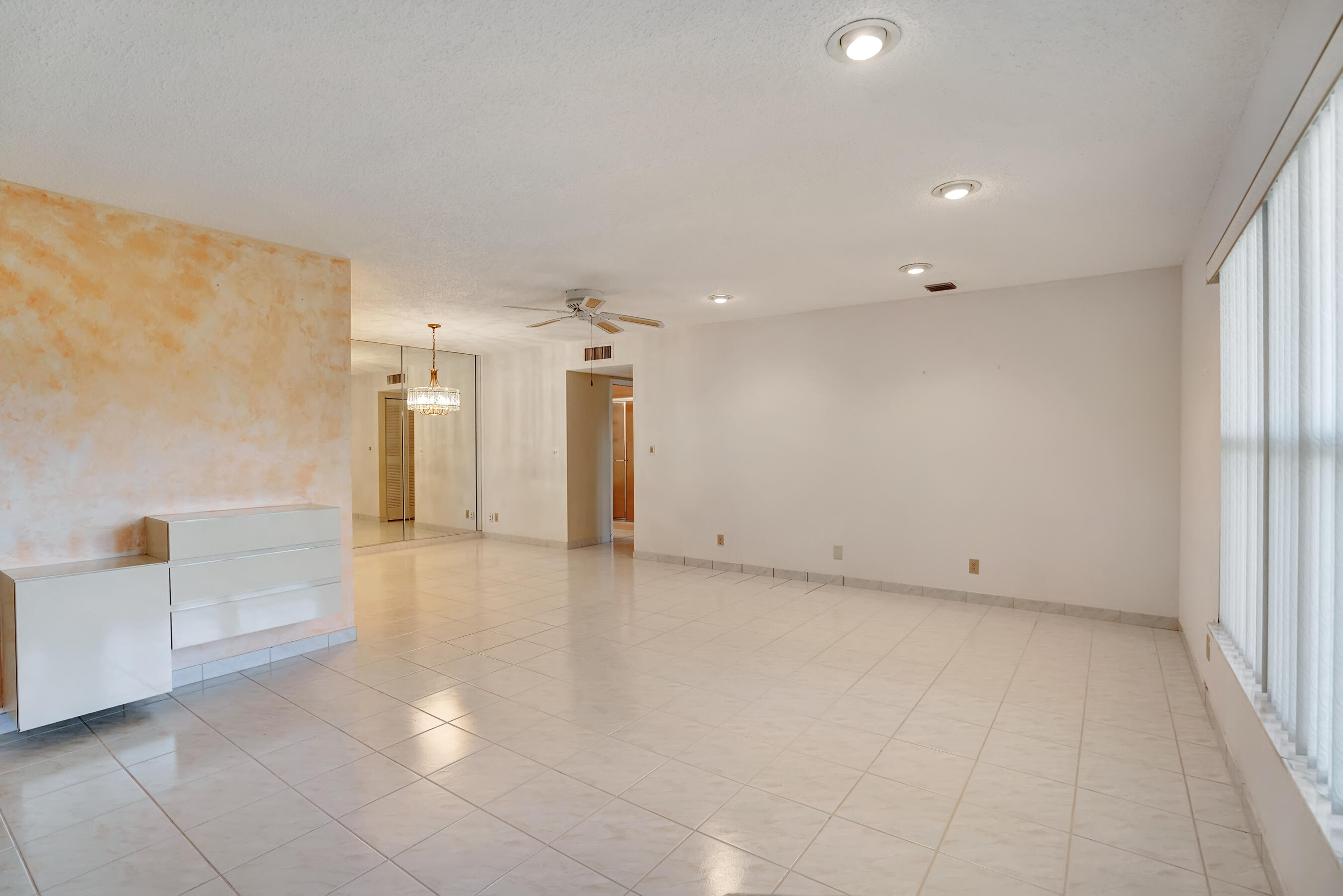14100 Nesting Way, Unit D Delray Beach, FL 33484 - Photo 9 of 31 a view of an empty room with a window