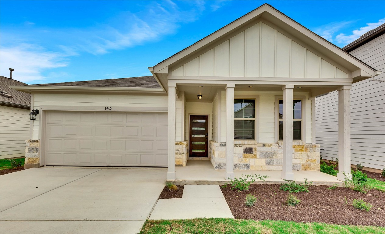 143 Gullivers Drive Elgin, TX 78621 - Photo 1 of 1 a front view of a house with a yard