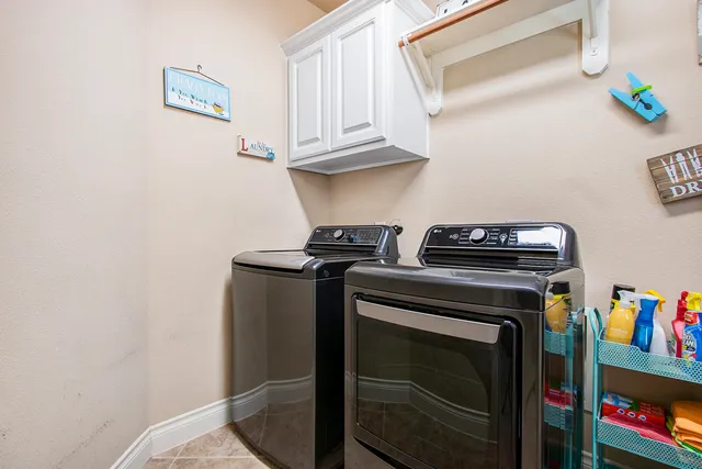 a kitchen with a stove and cabinets