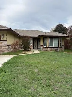 a house view with a garden space