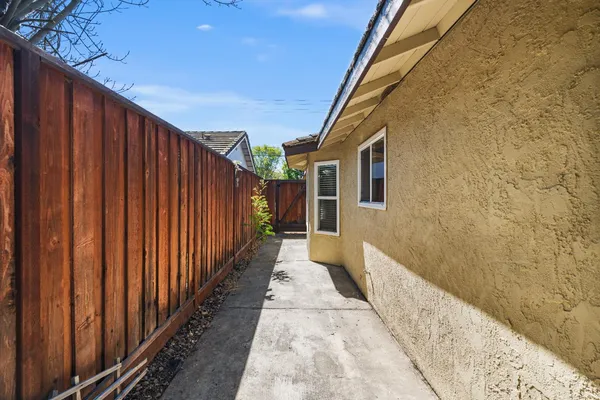 a view of a balcony with wooden floor
