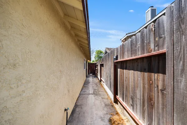 an aerial view of residential building and lake