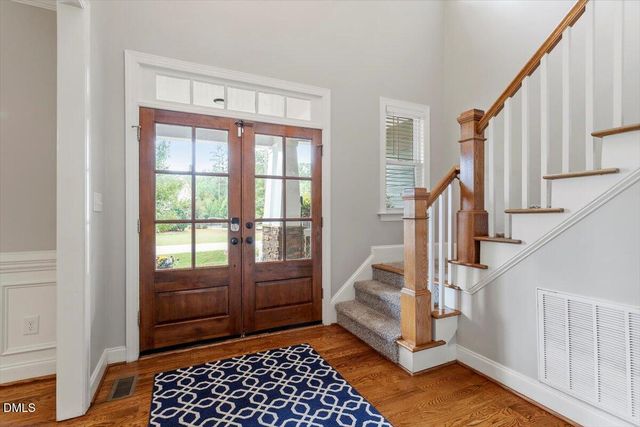 a view of entryway with stairs and furniture