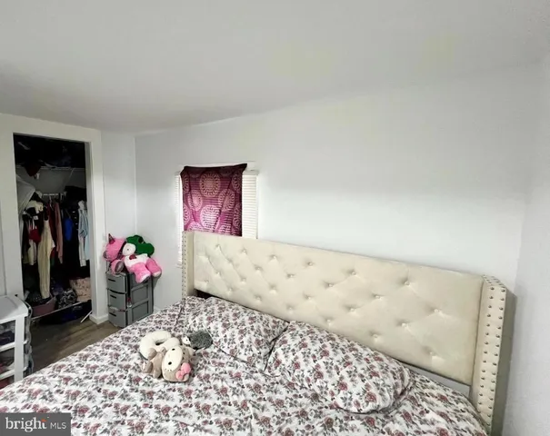 a front view of a house with a wooden fence