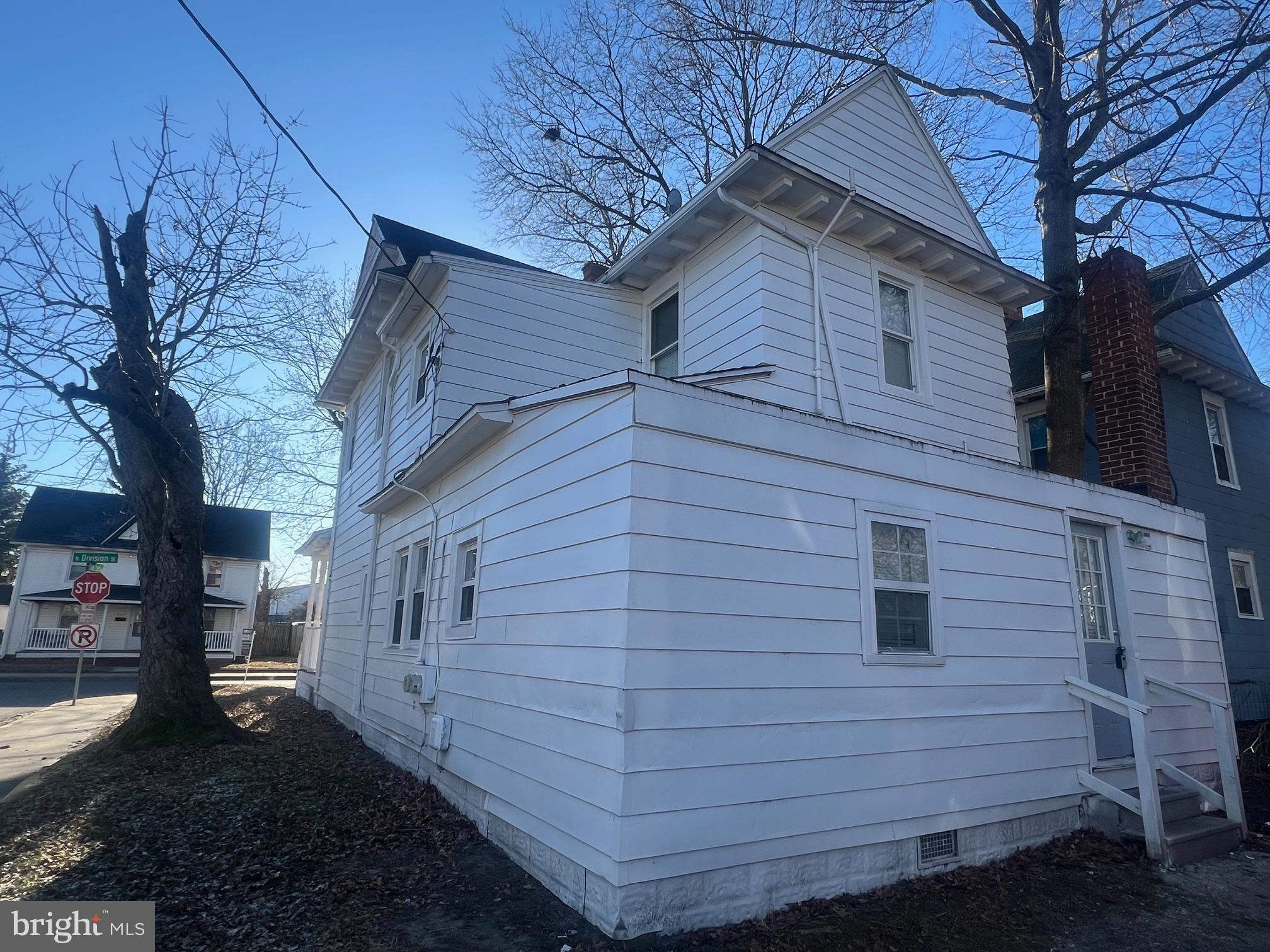 810 North Division Street Salisbury, MD 21801 - Photo 33 of 38 a view of a wooden house with a yard