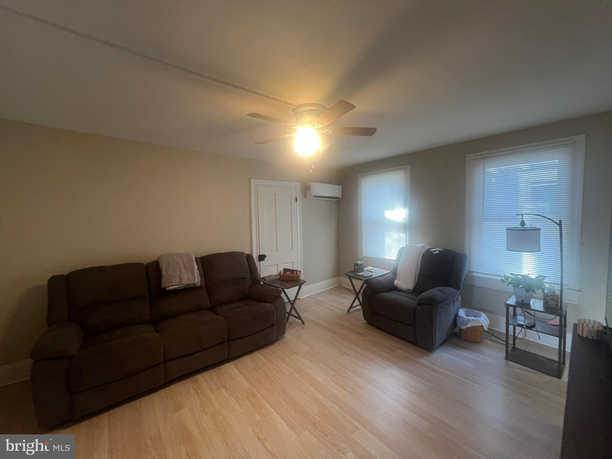 810 North Division Street Salisbury, MD 21801 - Photo 4 of 38 a living room with furniture and a couch
